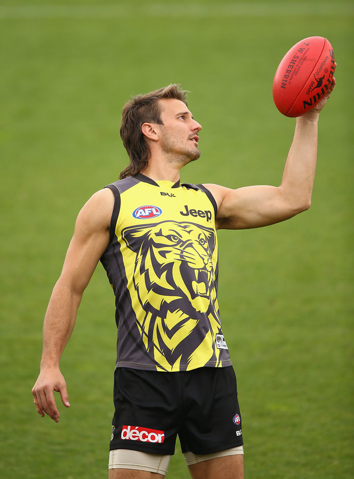 AFL 2016 Training - Richmond 210416 MELBOURNE, AUSTRALIA - APRIL 21: Ivan Maric of the Tigers controls the ball during a Richmond Tigers AFL training session at Punt Road Oval on April 21, 2016 in Melbourne, Australia. (Photo by Robert Cianflone/Getty Images/AFL Media)